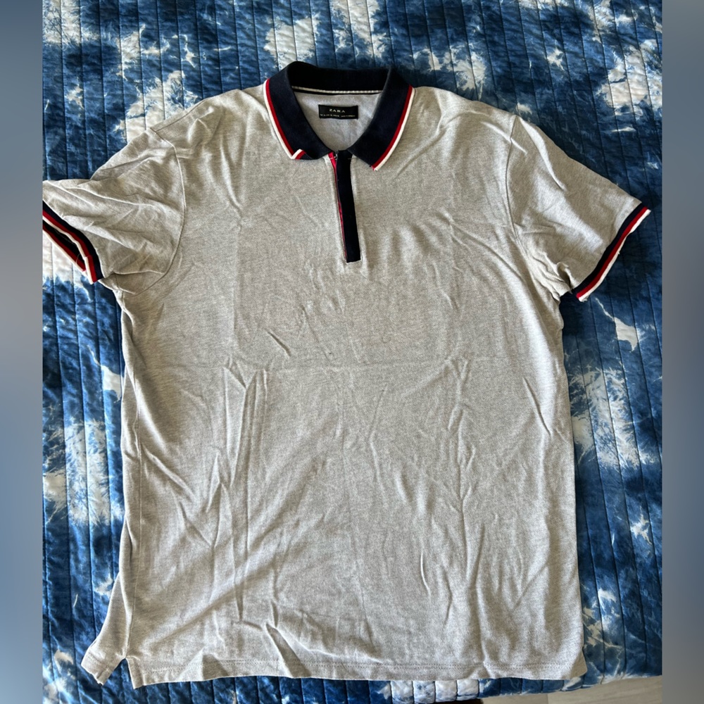 Zara gray zip-up polo with blue and red accents on collar and sleeves